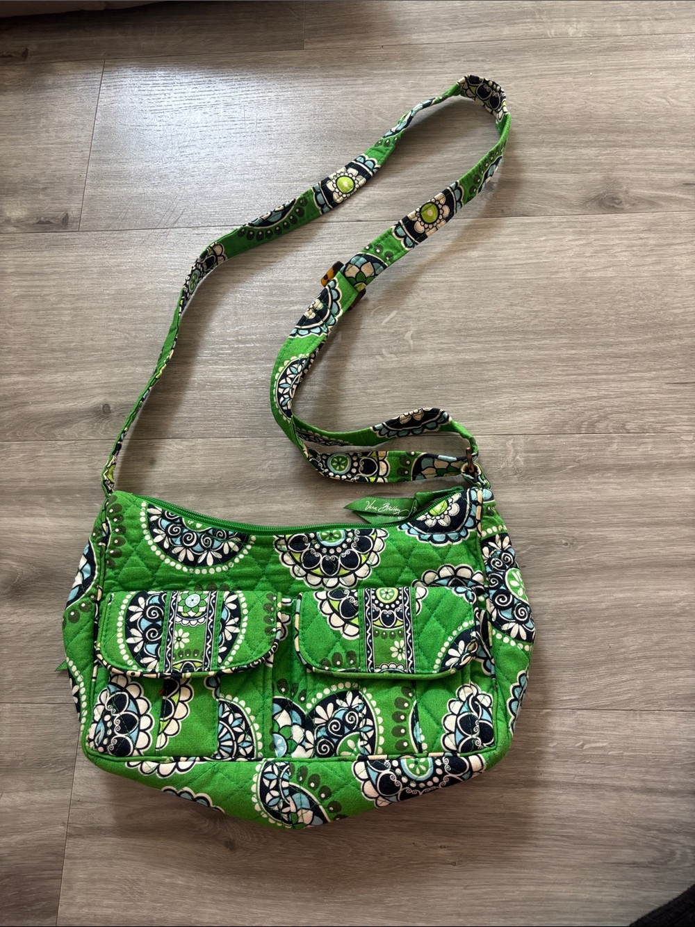 Green Quilted Crossbody Bag with Floral Medallion Pattern
